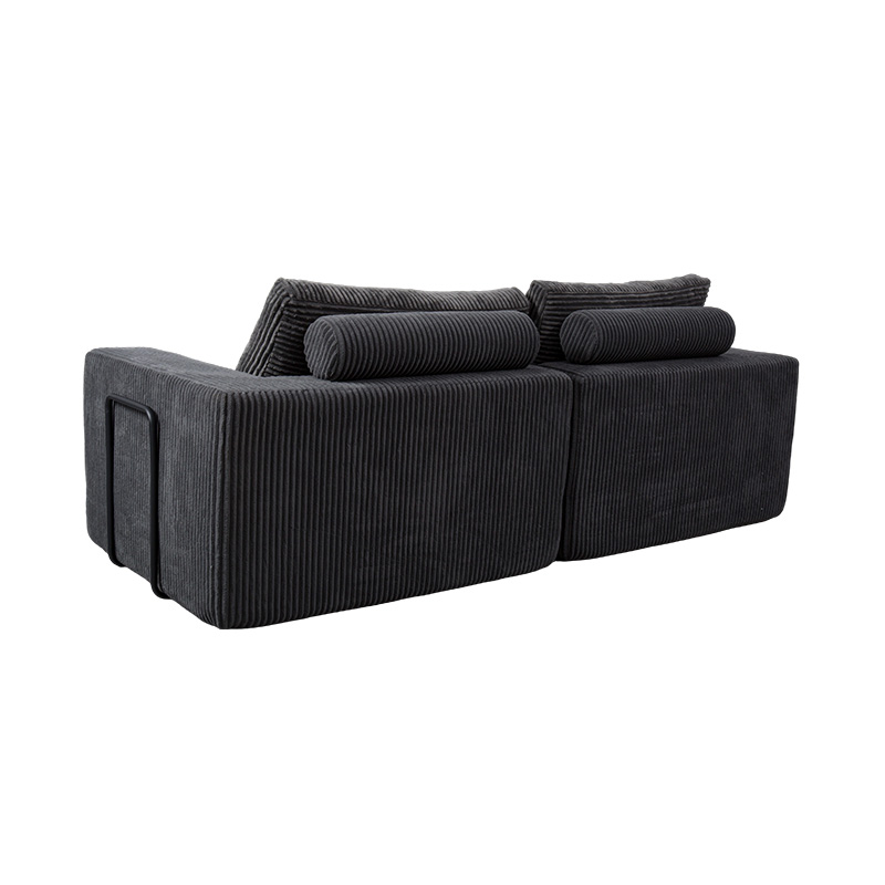 Moderne konvertibel sofa i mørkegrå kordfløyel med puter, fleksibel modulær layout