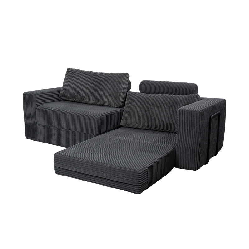 Moderne konvertibel sofa i mørkegrå kordfløyel med puter, fleksibel modulær layout