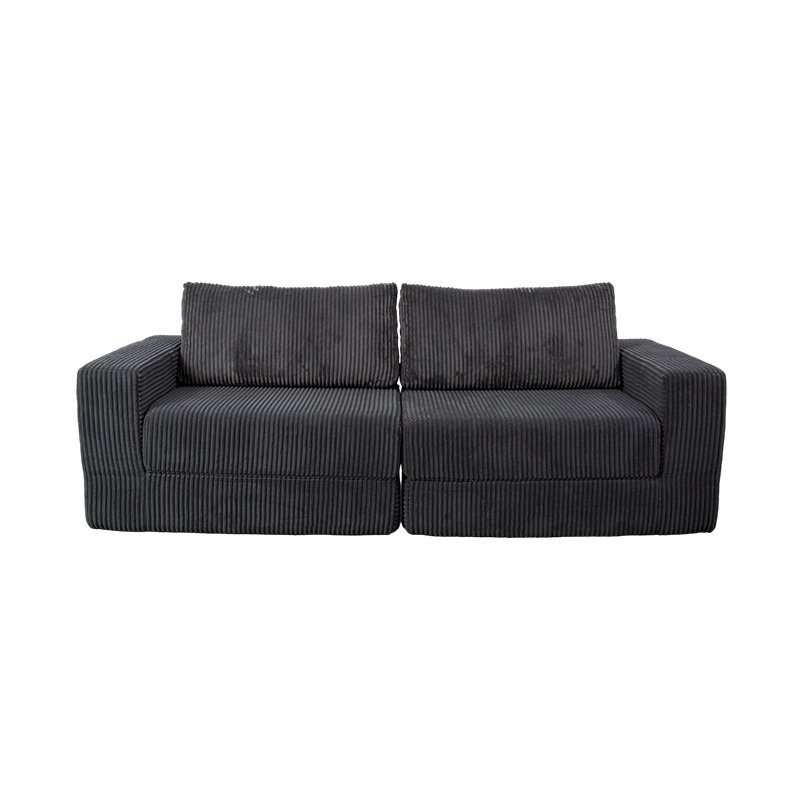 Moderne konvertibel sofa i mørkegrå kordfløyel med puter, fleksibel modulær layout