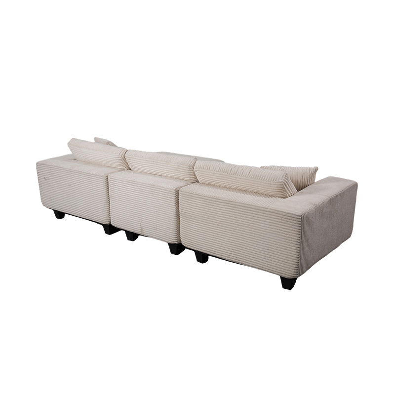 Stor L-formet hjørnesofa i off-white cordfløyel med moderne minimalistisk design