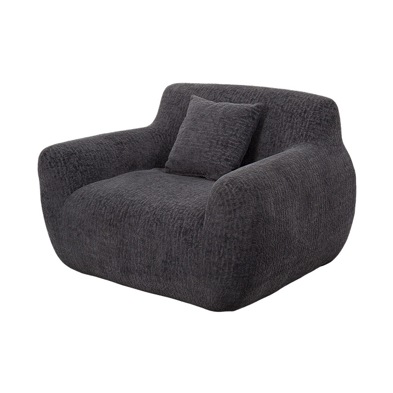 Enkeltsofa i klemstil i full skum med kraftig chenillestoff og subtilt jacquardmønster Enkeltsofa i klemstil i full skum med kraftig chenillestoff og subtilt jacquardmønster